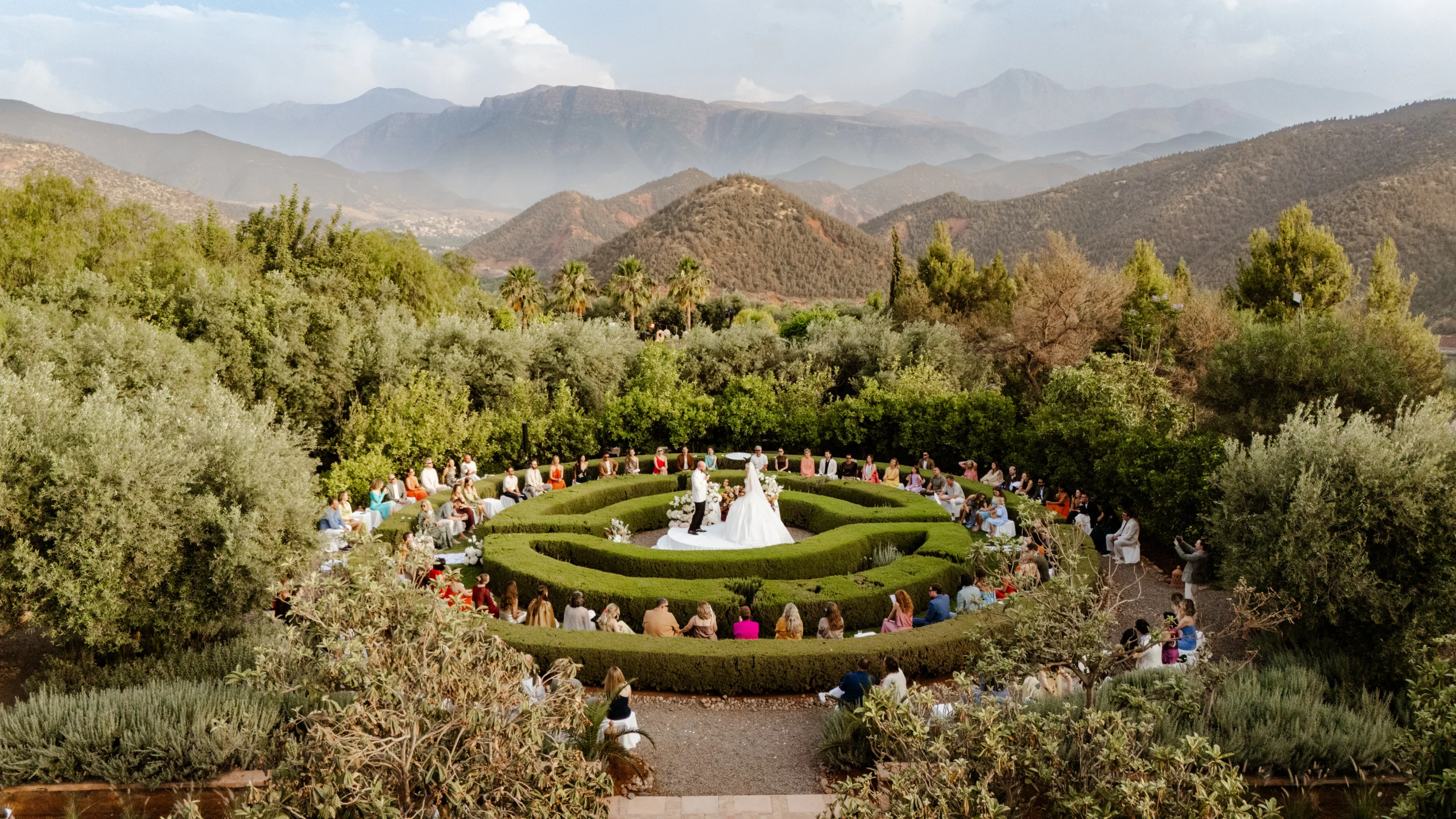 a building surrounded by mountains